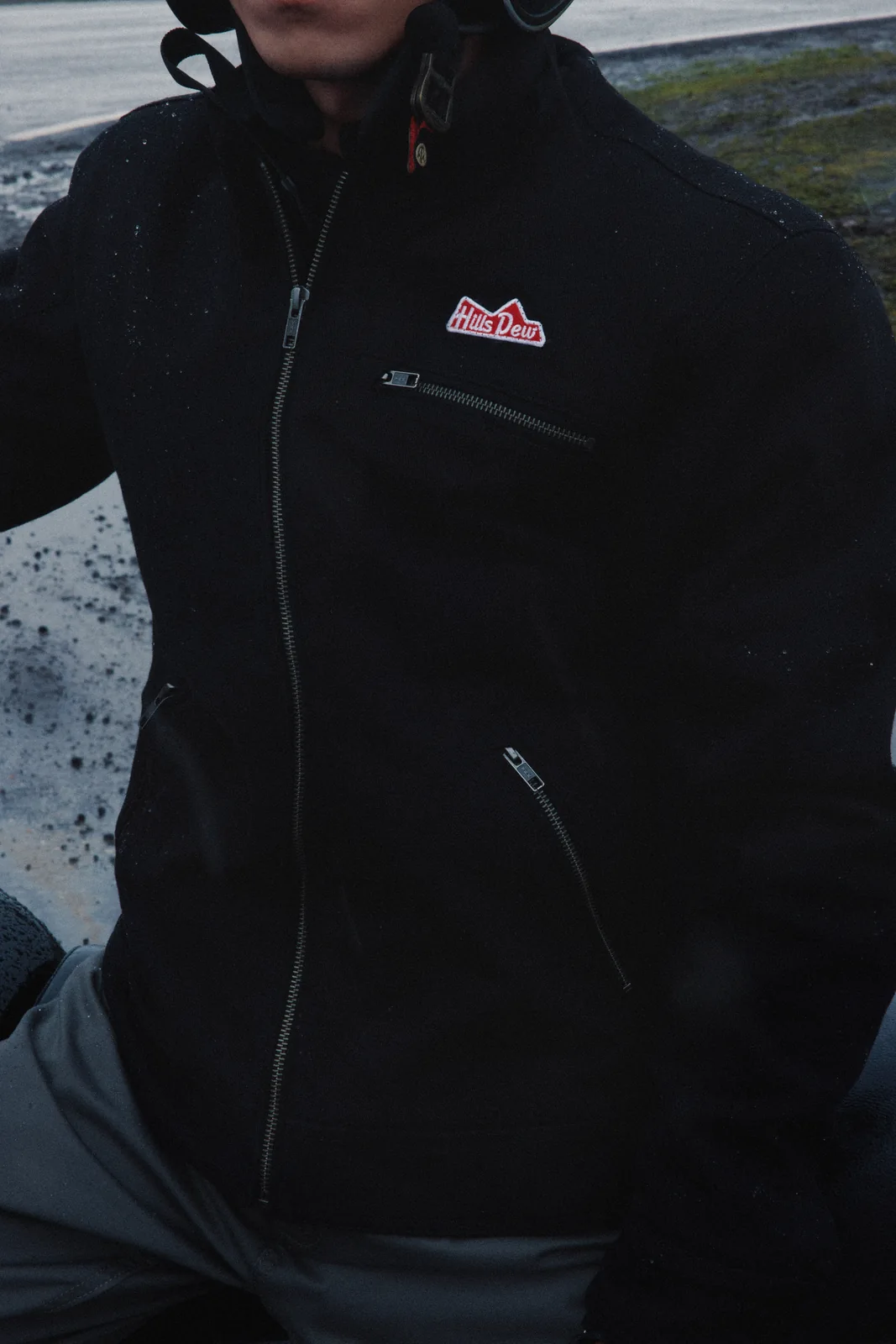 A closer look at the chest zip and HillsDew mark.